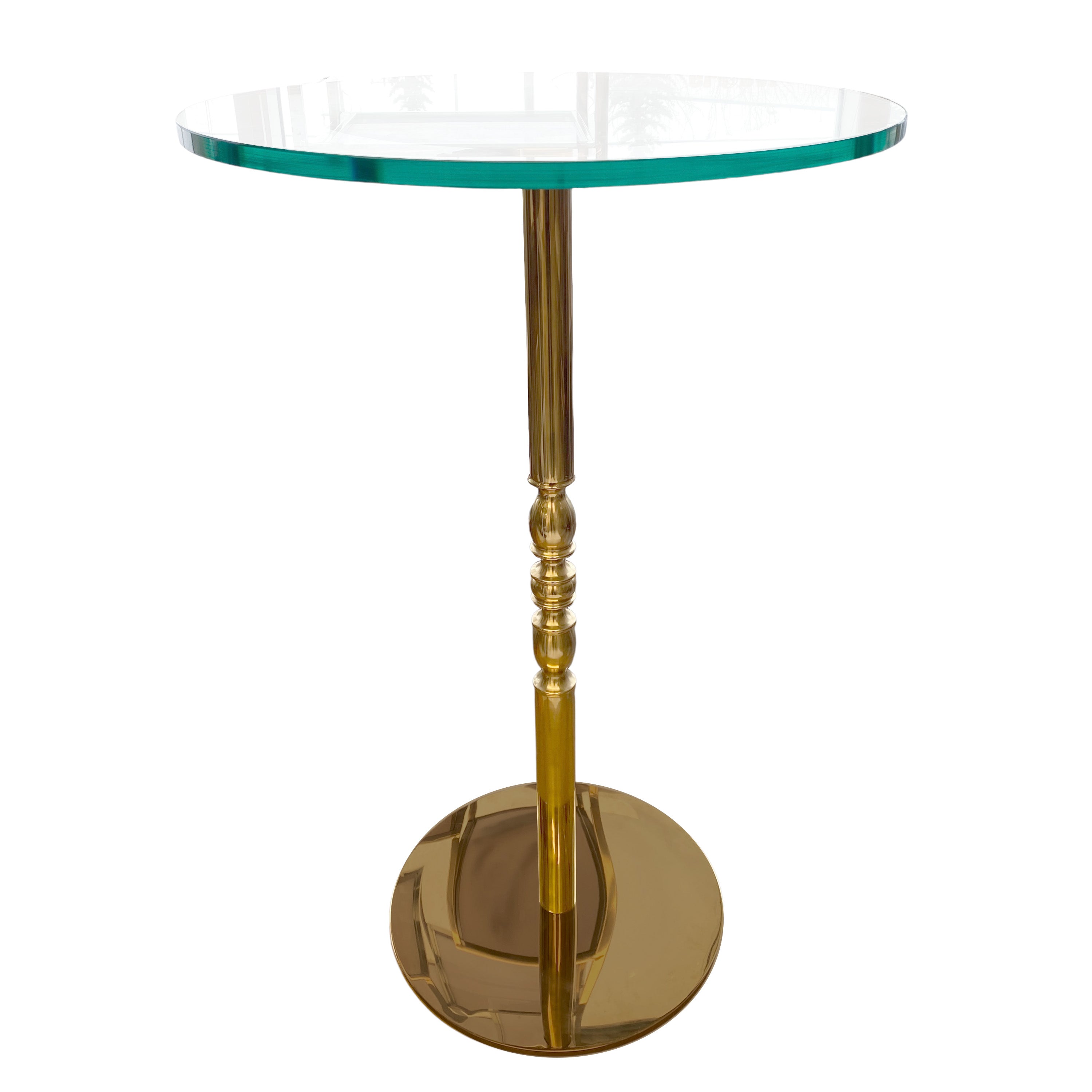 Glass top table with a vintage gold metal base.