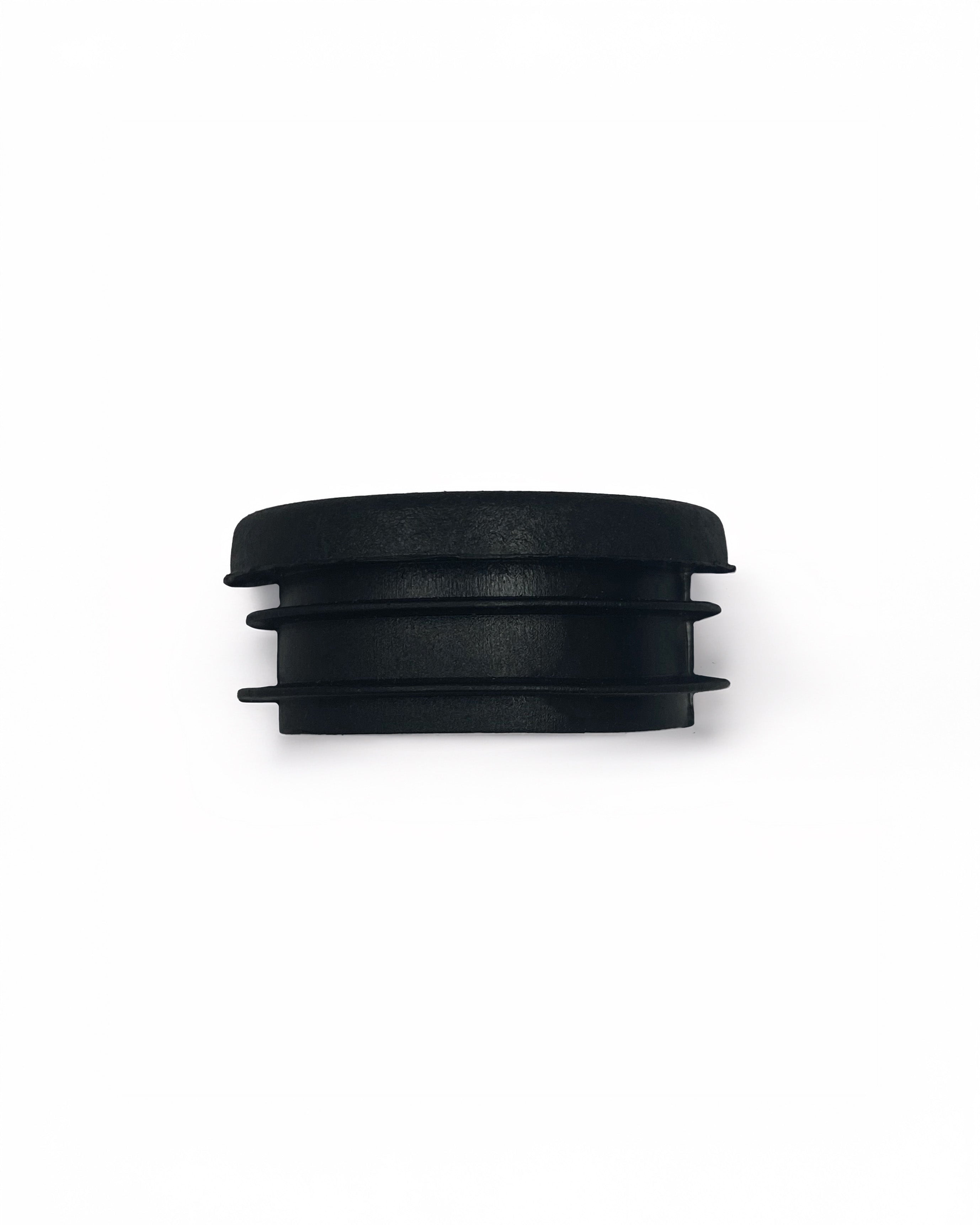 Black round plug to go on the end of a guardrail pole. 